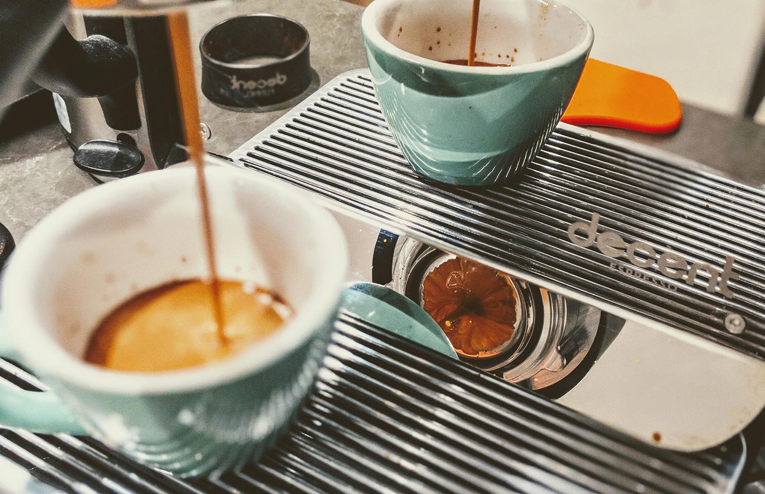 Why do you pour espresso over a spoon?