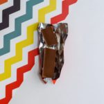 Why does Hershey's chocolate taste like vomit?