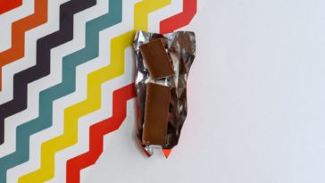 Why does Hershey's chocolate taste like vomit?