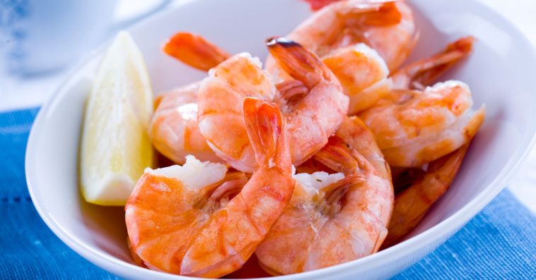 Why does shrimp turn pink when cooked?