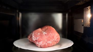 Why is defrosting meat in microwave bad?