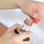 Why is it easier to open a bottle cap using a bottle opener?