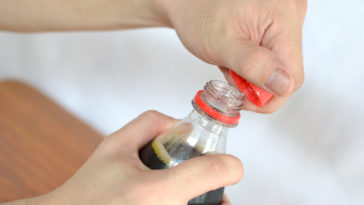 Why is it easier to open a bottle cap using a bottle opener?