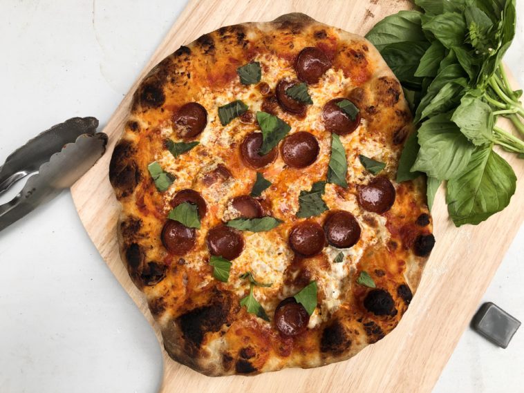 Why is my pizza stuck to the stone?