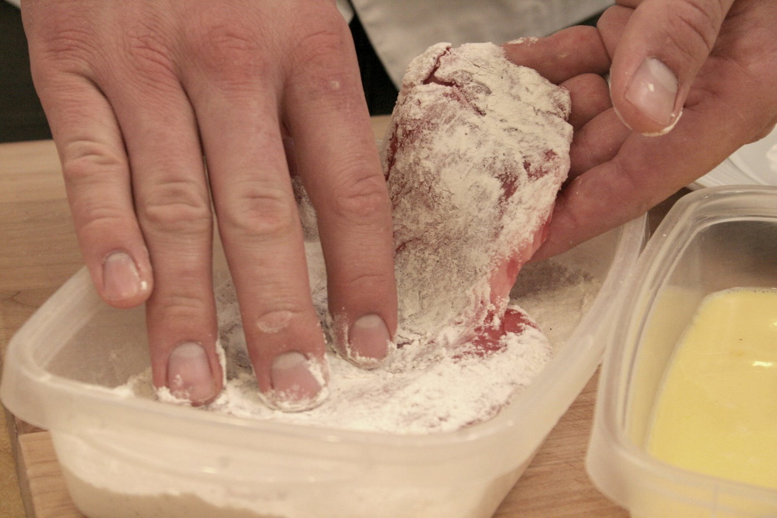 What do you dip chicken in before breading?