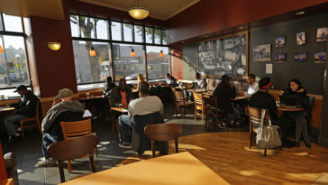 Can you sit inside Starbucks now 2021?