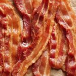 Does Five Guys charge extra bacon?