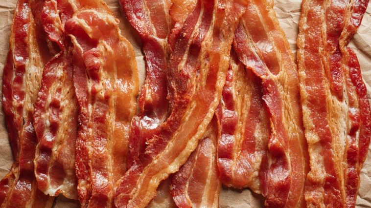 Does Five Guys charge extra bacon?