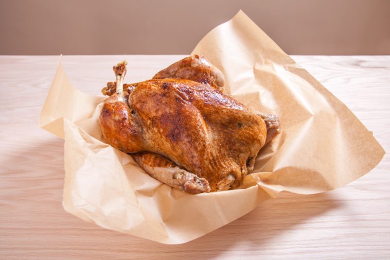 How do you cook a precooked turkey?