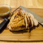 How do you cook a precooked turkey breast in the oven?