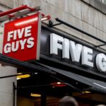 How much does a five guys make a year?