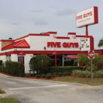 How much does it cost to start up a Five Guys?