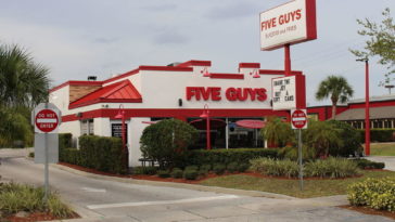 How much does it cost to start up a Five Guys?