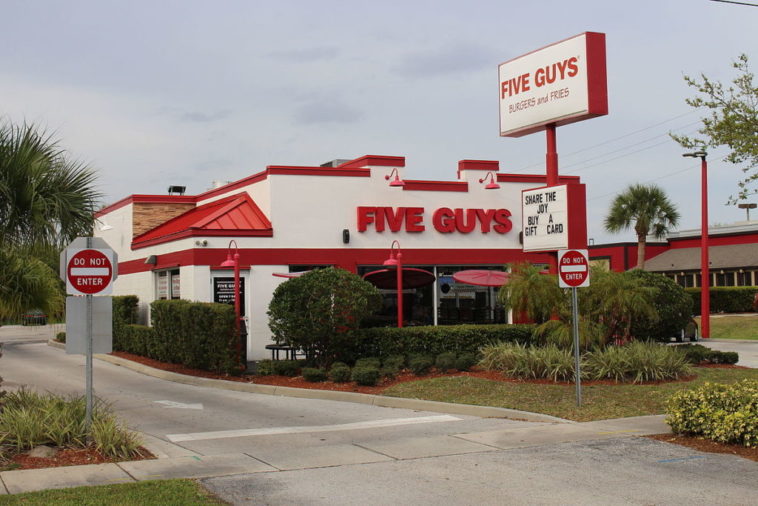How much does it cost to start up a Five Guys?