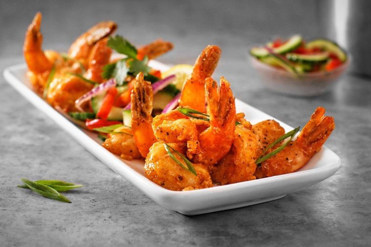 What can you not wear to Ruth Chris?