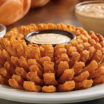 What day do you get a free Bloomin Onion at Outback?
