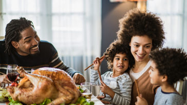 What do black families cook for Thanksgiving?