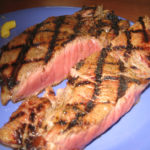 What does Golden Corral season their steaks with?