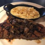 What is smother your steak at Saltgrass?