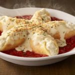 What kind of cheese is in the stuffed shells at Olive Garden?
