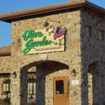 What restaurant owns Olive Garden?