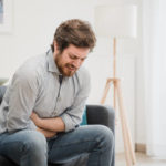 Why do I feel sick after eating Alfredo?