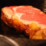Why do chefs put butter on steak?