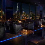 Does The New Yorker Hotel have a roof top bar?
