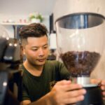 How can I promote my coffee shop?