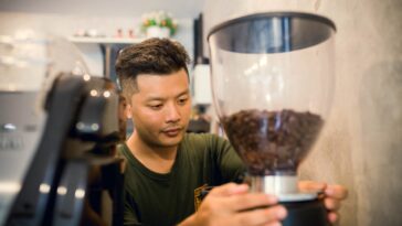 How can I promote my coffee shop?