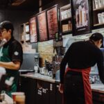 How do I report a coworker to Starbucks?