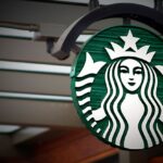 How do I report a partner to Starbucks?