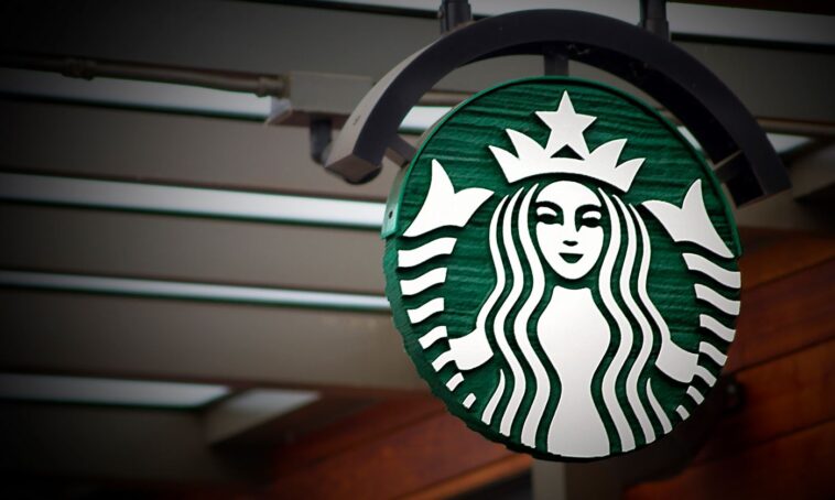 How do I report a partner to Starbucks?