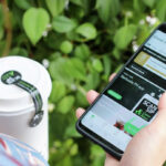 How do you pay with the Starbucks app?