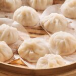How do you pronounce pork xiao long bao?