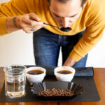 How do you slurp coffee for cupping?