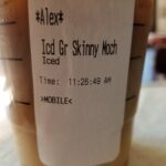 How many calories are in a venti caramel macchiato with coconut milk?