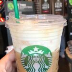 How many calories are in a venti vanilla latte with almond milk?