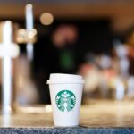 How many stores did Starbucks open in 2021?
