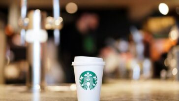 How many stores did Starbucks open in 2021?