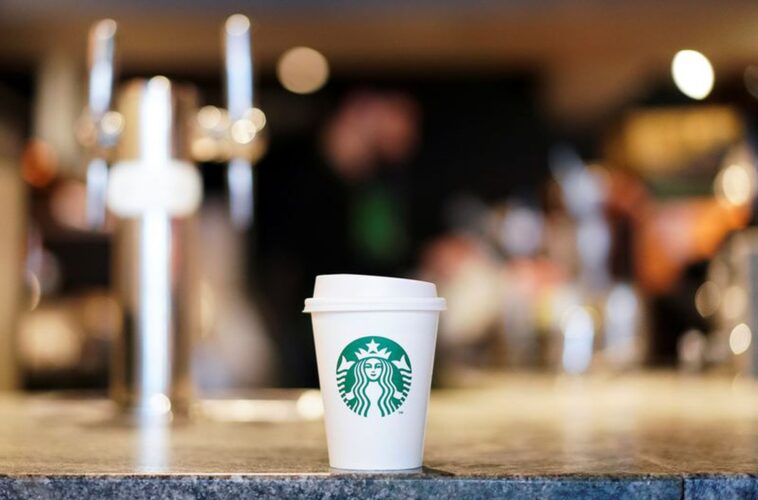 How many stores did Starbucks open in 2021?