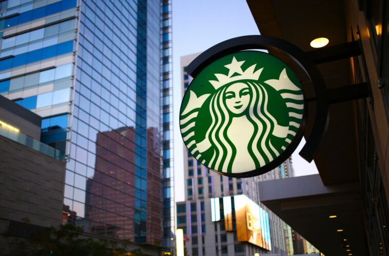 How many stores is Starbucks opening in 2021?