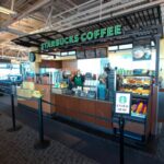 What does Starbucks pay in Denver?