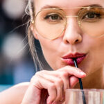 What does a black straw in a drink mean?