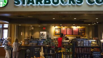 What year did Starbucks open in NYC?