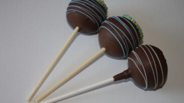 Why do my cake pop sticks turn yellow?