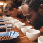 Why does Starbucks avoid companies that restrict competition?