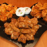 Are traditional or boneless wings healthier?