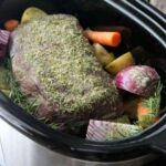 Can I put a frozen pot roast in the crockpot?