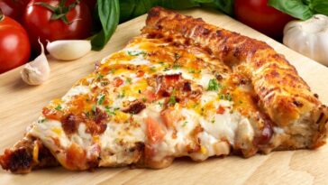 Can you reheat cooked frozen pizza?